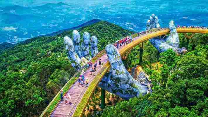 Vietnam’s new golden bridge is held up by these enormous stone hands